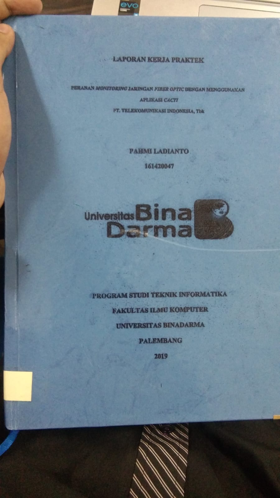 Cover PERANAN MONITORING JARINGAN FIBER OPTIC DENGAN MENGGUNAKAN APLIKASI CACTI PT. TELEKOMUNIKASI INDONESIA TBK. / PAHMI LADIANTO